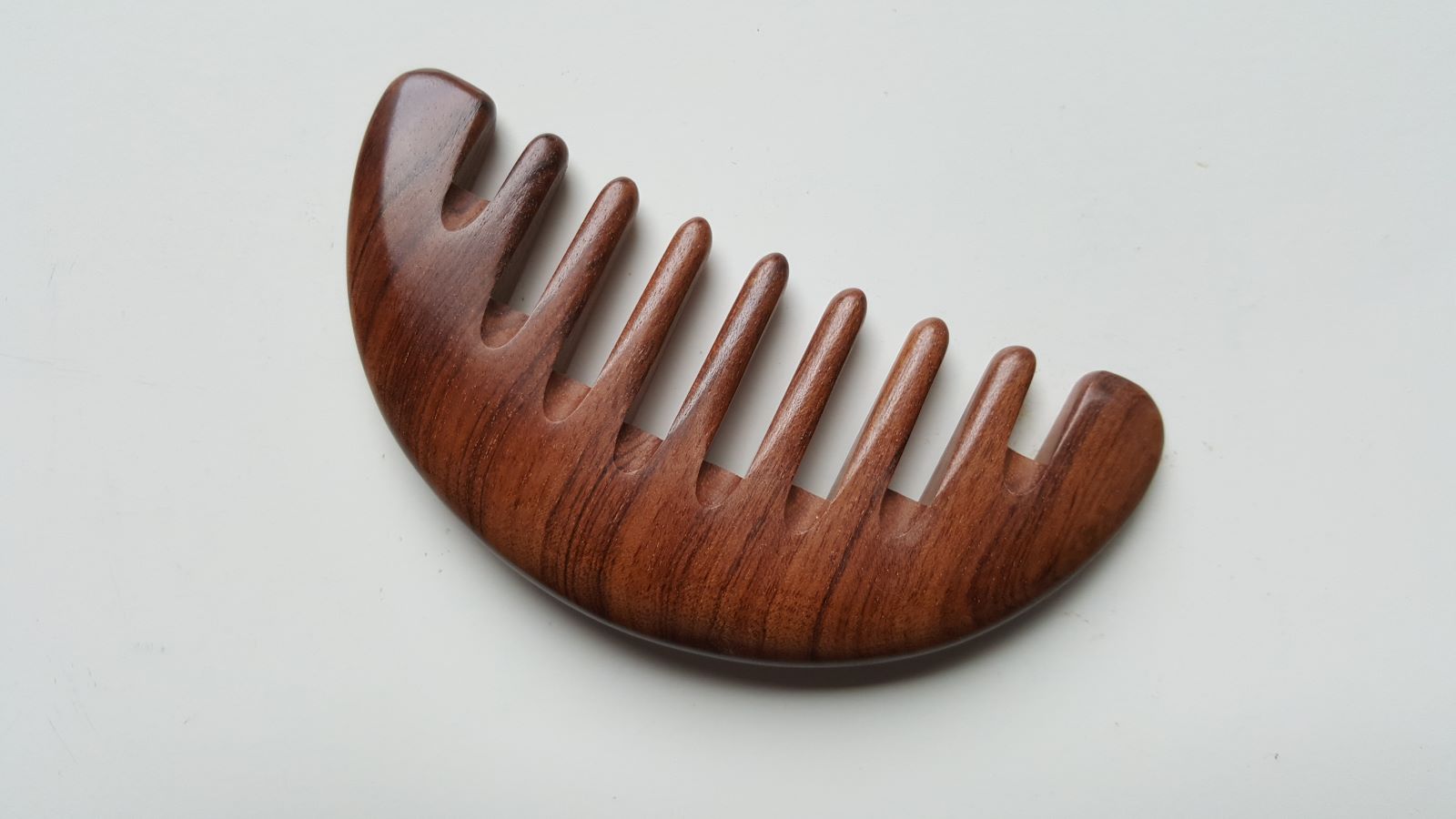 Extra wide tooth African Mopane comb, 0.5 cm spacing, rounded tips for snag-free detangling of thick, curly, and coily hair | Arakicrafts