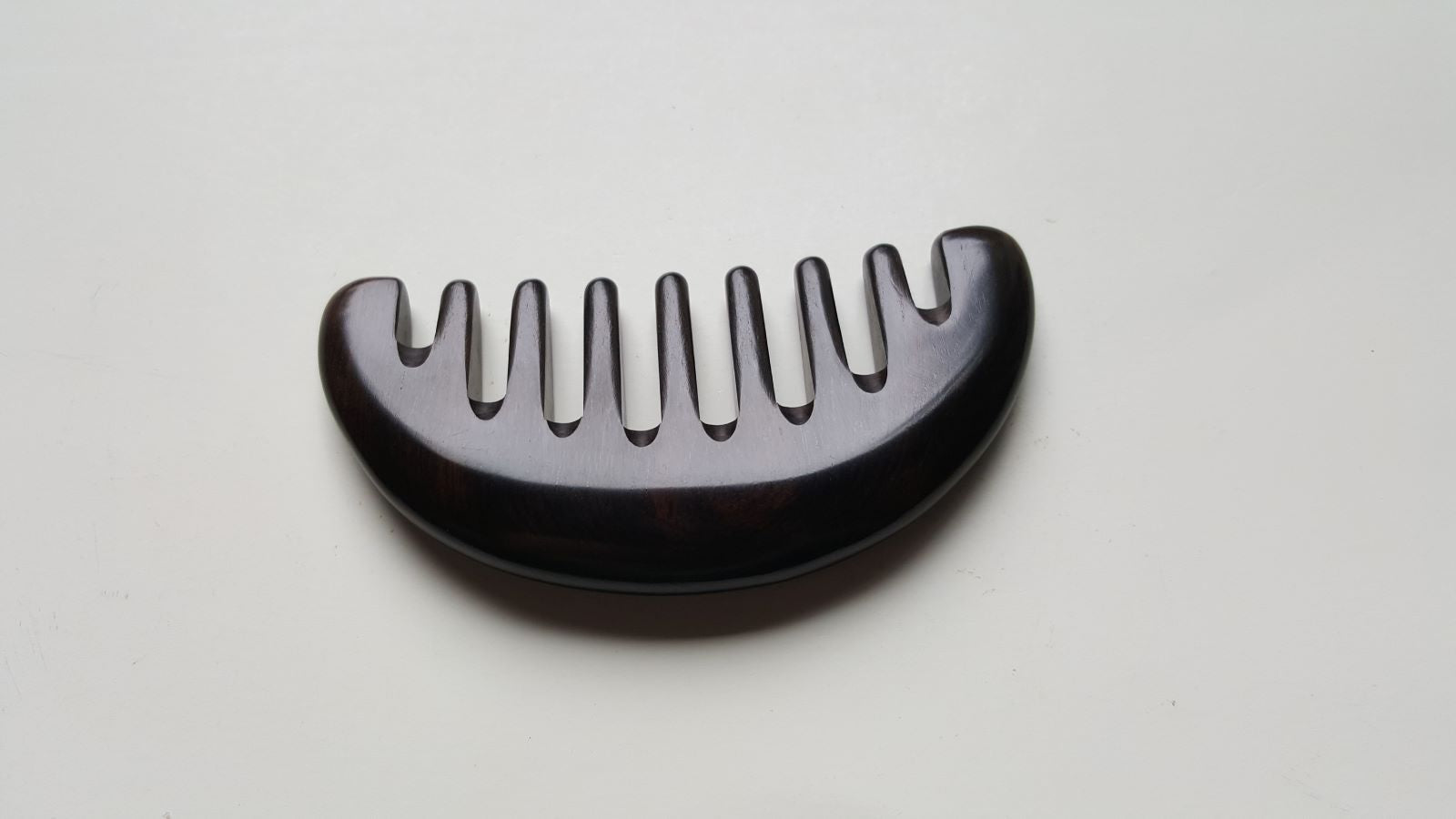 African Ebony half moon comb, jet-black hardwood, extra wide teeth, handcrafted wood hair comb | Arakicrafts