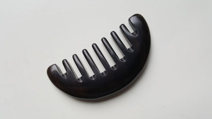 Convex arched spine of African Ebony half moon comb, single-piece hardwood construction, comfortable palm grip | Arakicrafts

