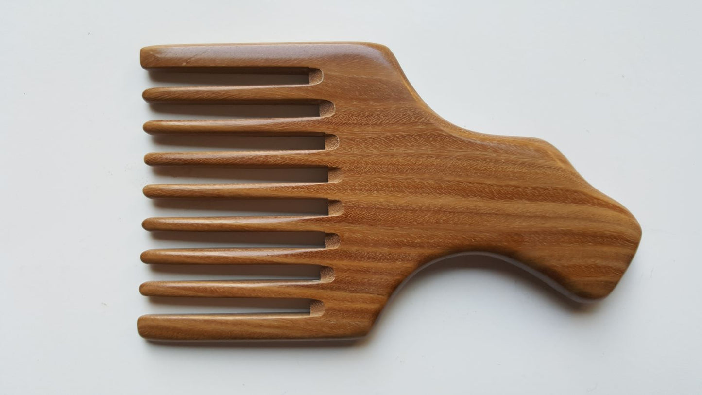 A wooden pick comb with a unique handle design. The comb has nine teeth and is made of light brown sandalwood.  Gift for love ones who grows long hair!