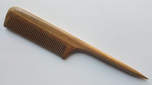 hand inlayed sandalwood rat tail comb with a long pointed handle. 