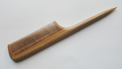 A light brown wooden comb with pointed end and fine teeth. It's designed for hair styling and sectioning.