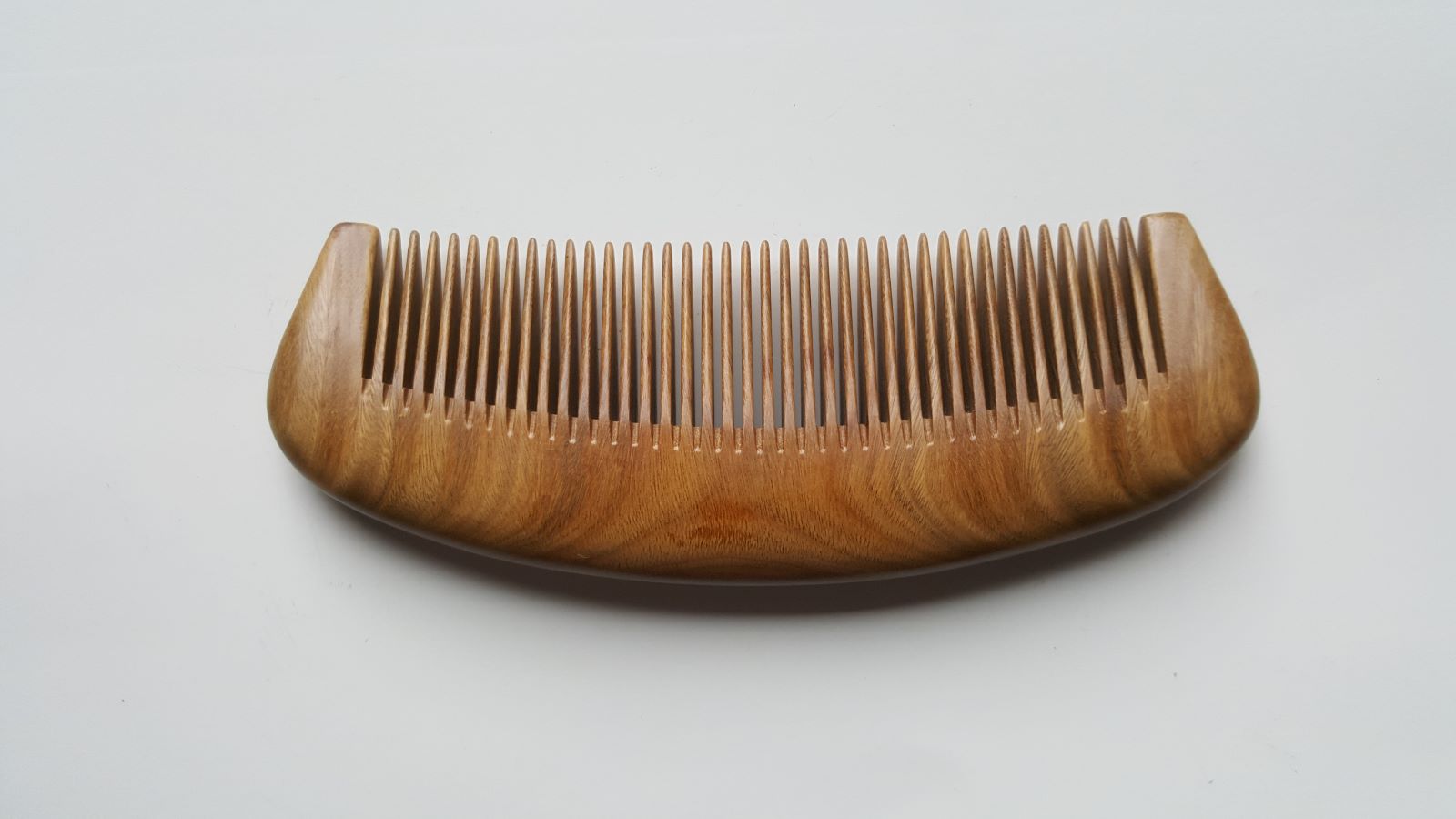 Arakicrafts classic wooden comb -lying view, gift for her, comes with gift bag