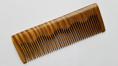 Anti-static Green Sandalwood comb for smooth, snag-free combing, flat lay — Arakicrafts