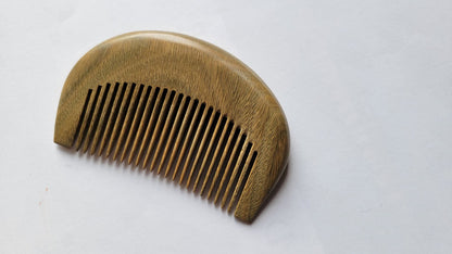 Handcrafted mini sandalwood comb, fine teeth,  aromatic, anti-static, ready to gift comes with  gift bag. 