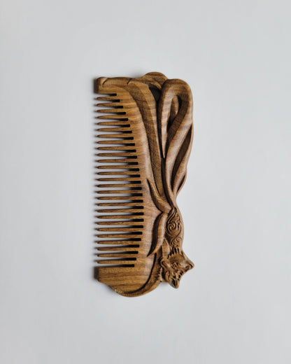 Fox hand carved sandalwood comb front view — artisan crafted, green sandalwood