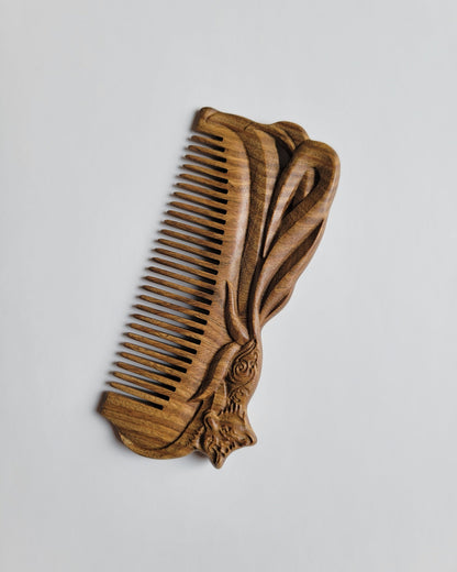 Hand carved fox design sandalwood comb — both sides showing artisan carved fox motif
