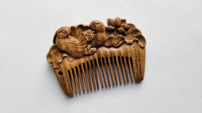 Mandarin duck hand carved green sandalwood comb, fine teeth facing down, full silhouette — Arakicrafts