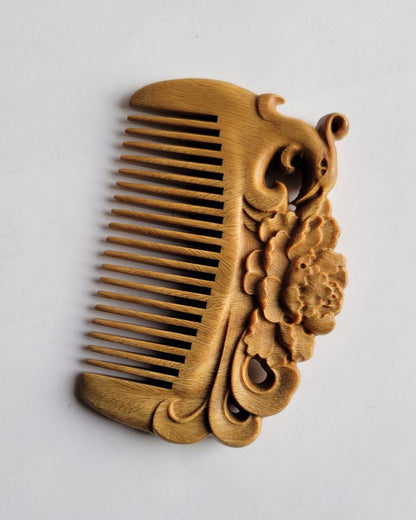 Hand carved sandalwood comb with floral design, travel size and comes with gift bag. Vintage style hair Comb