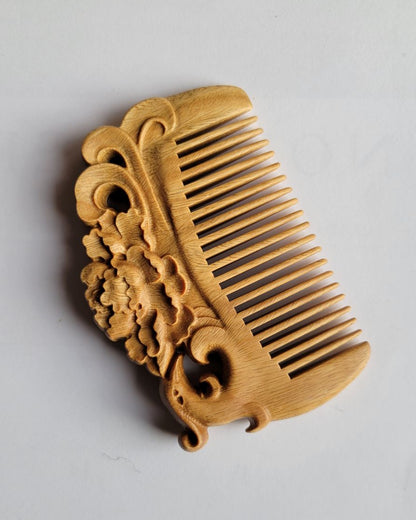 Handcrafted wooden comb with intricate decorative carvings, fine teeth, self care gift, collector's piece  