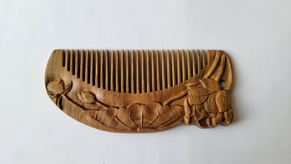 Blooming lotus lifecycle carving on Green Sandalwood comb — bud, grand leaf, and full bloom in continuous panoramic relief — Arakicrafts