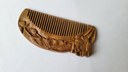 Reverse side of Tongjing lotus sandalwood comb — panoramic carving flows seamlessly across both faces with perfect symmetry — Arakicrafts