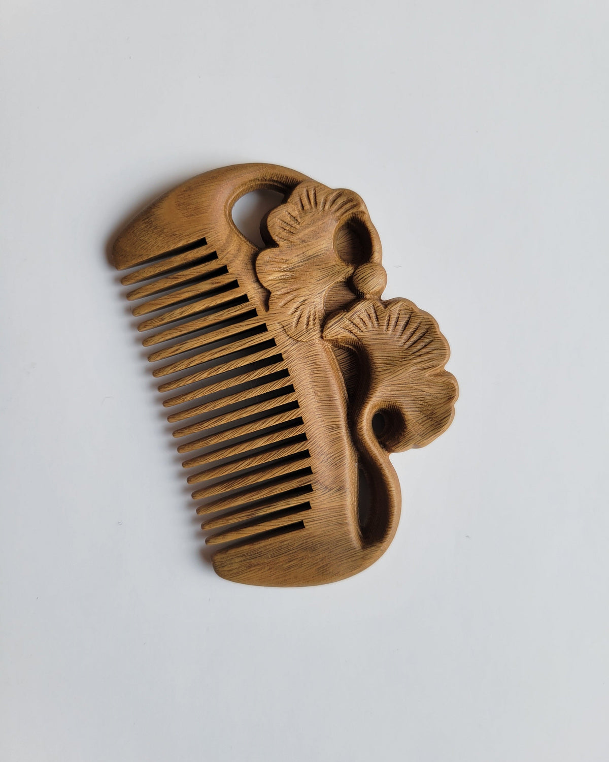 Hand carved ginkgo leaf motif Green Sandalwood pocket comb — golden olive hardwood, fine teeth, symbol of peace and hope