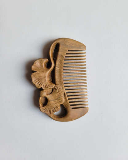 Reverse side ginkgo leaf comb — single-piece Green Sandalwood, rounded fine teeth, comfortable easy grip pocket comb