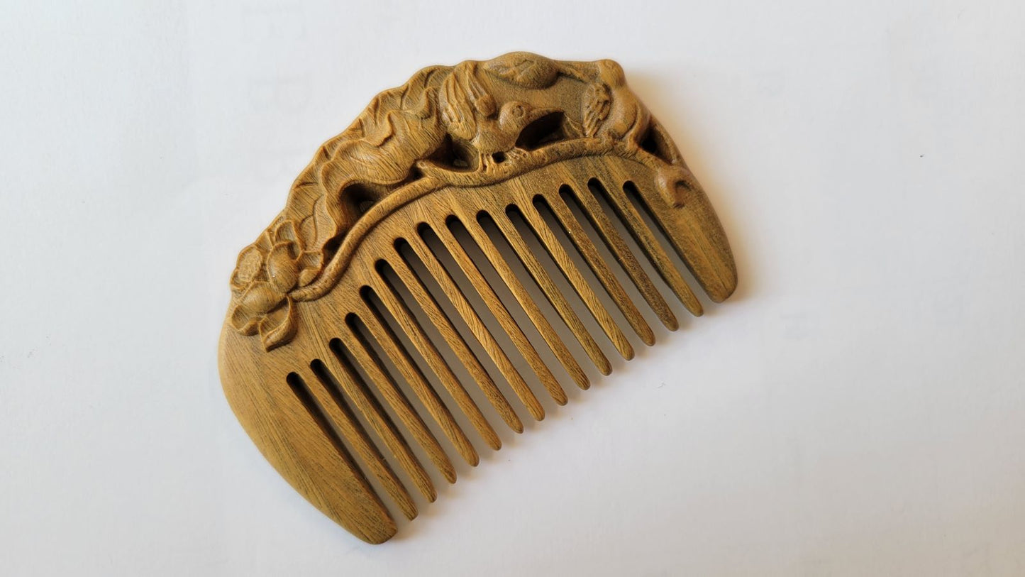 Hand-carved lotus and egret relief carving on green sandalwood comb spine, full three-dimensional carving detail