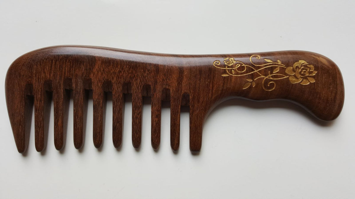 Dark Sucupira wood comb with hand-painted gold rose design — anti-static, natural hair care