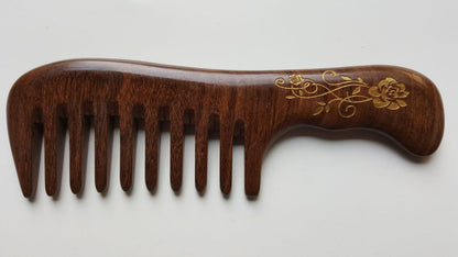 Dark Sucupira wood comb with hand-painted gold rose design — anti-static, natural hair care