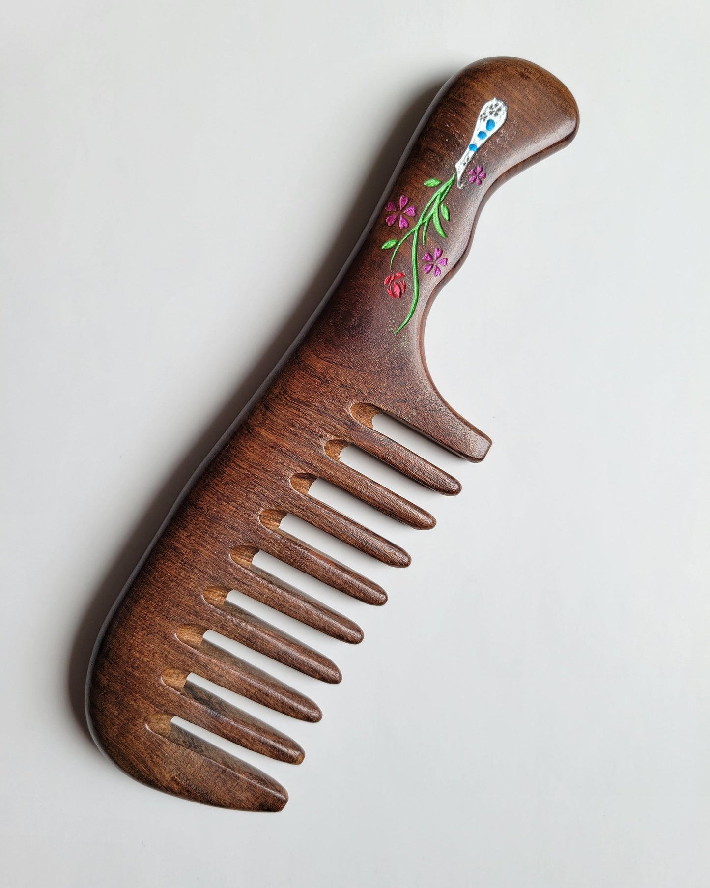 Natural hair care Sucupira wood comb — green and pink hand-painted garden floral motif, sustainable beauty, Mother's Day gift