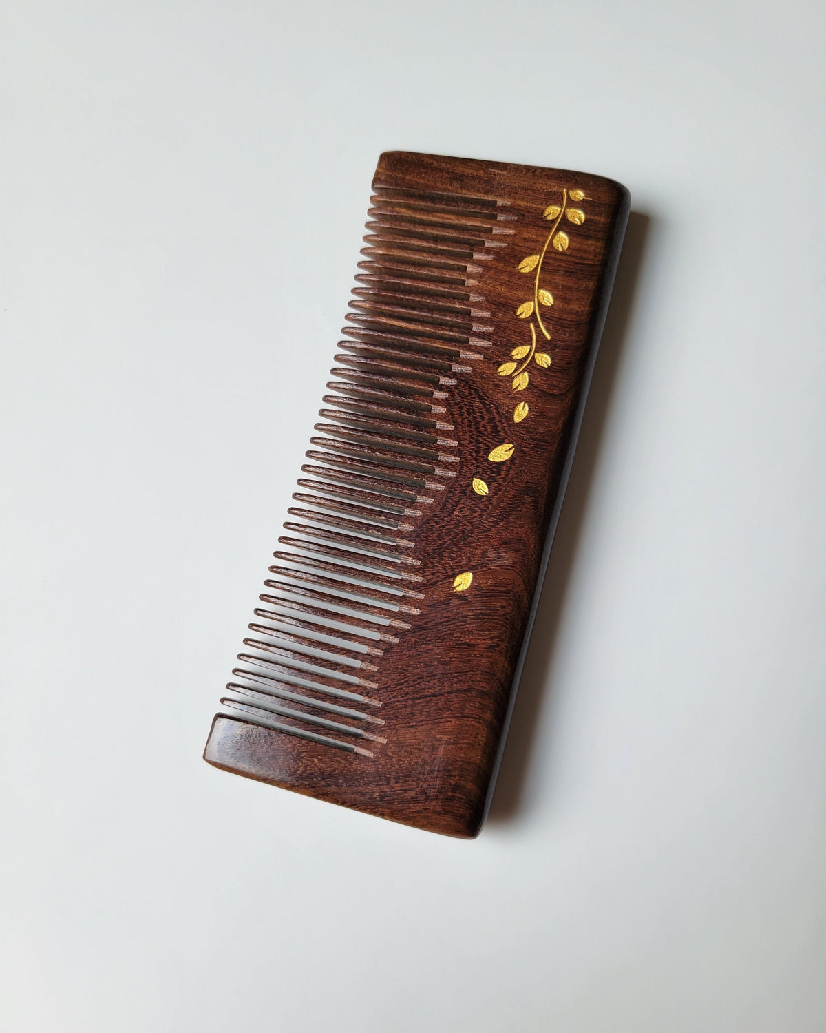 Fine tooth spacing 0.06 inch Sucupira wood comb — smooth detangling and scalp massage, gold ivy vine