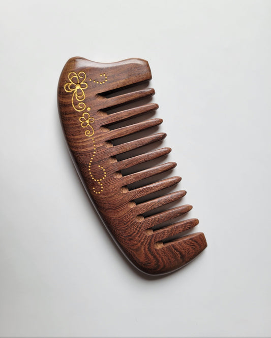 Hand-painted floral scroll Sucupira comb with comfortable no-handle grip, anti-static hardwood, distributes natural hair oils for shine