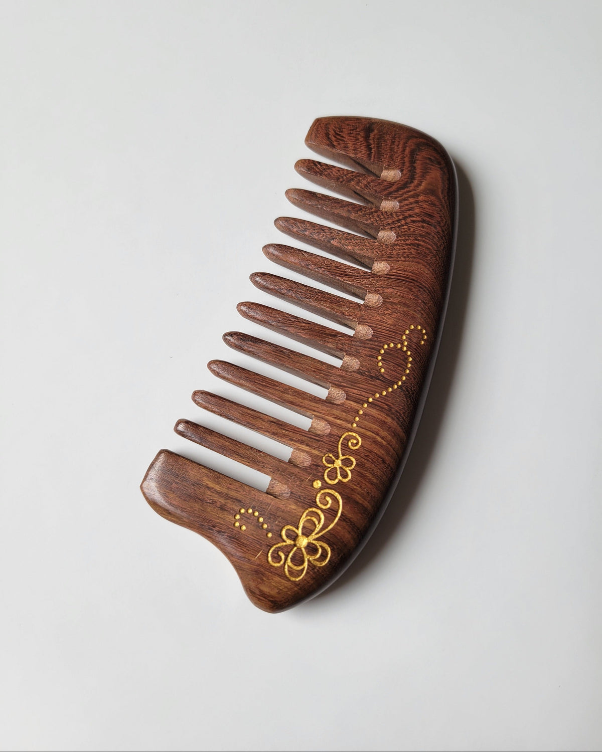 Sucupira wide tooth comb with gold floral vine painting, pocket-sized at 5.5 inches, travel hair comb for long and thick hair
