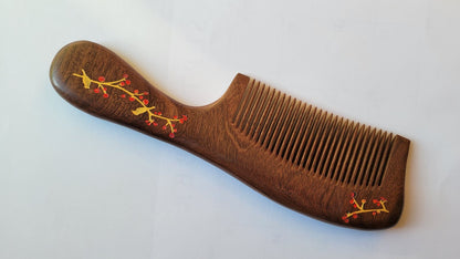 Sucupira hardwood fine tooth comb with hand-painted magpie and plum branch, dark chocolate-brown wood, Chinese happiness motif