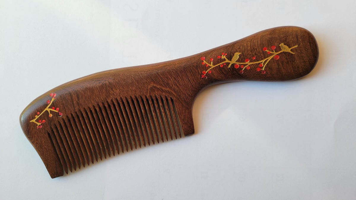 Sucupira wood comb with hand-painted magpie ascending plum tree, full-length composition, fine tooth anti-static hair comb