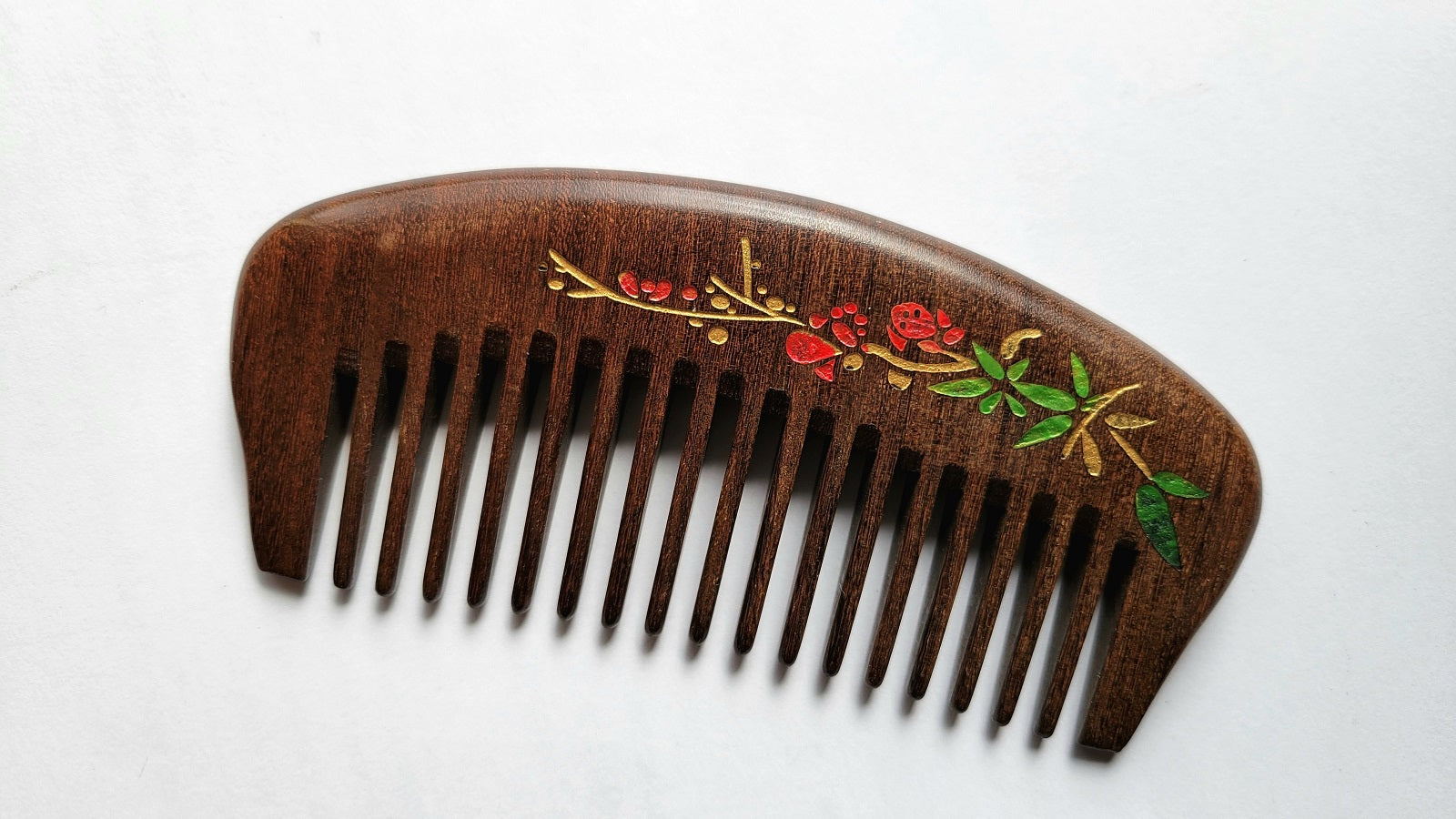 Wide tooth anti-static wood comb for curly, thick, and wavy hair, flat lay overhead view — Arakicrafts