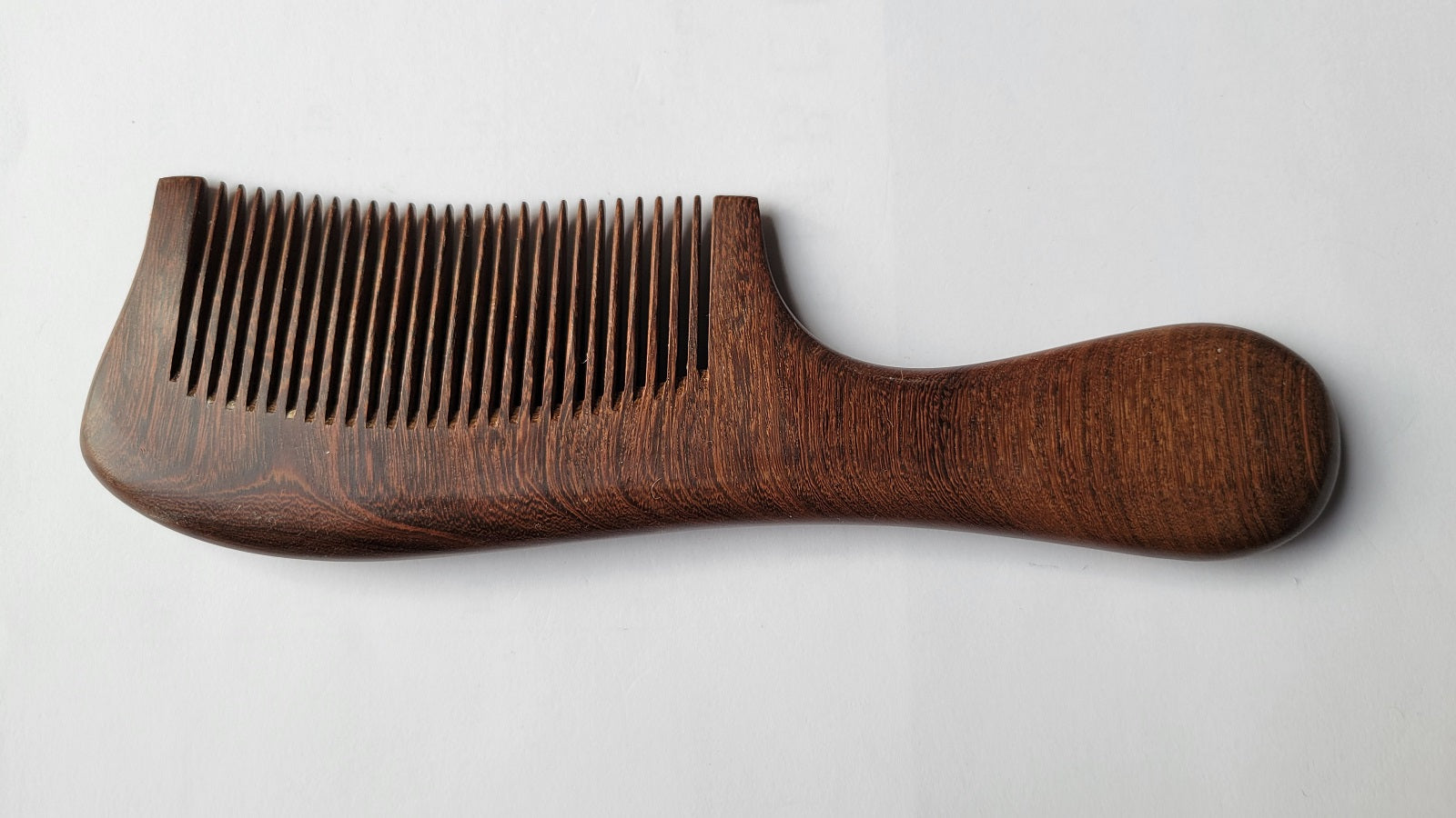Elegant painted wood comb for women — silver swallows and red flowers on dark Sucupira hardwood — Arakicrafts

