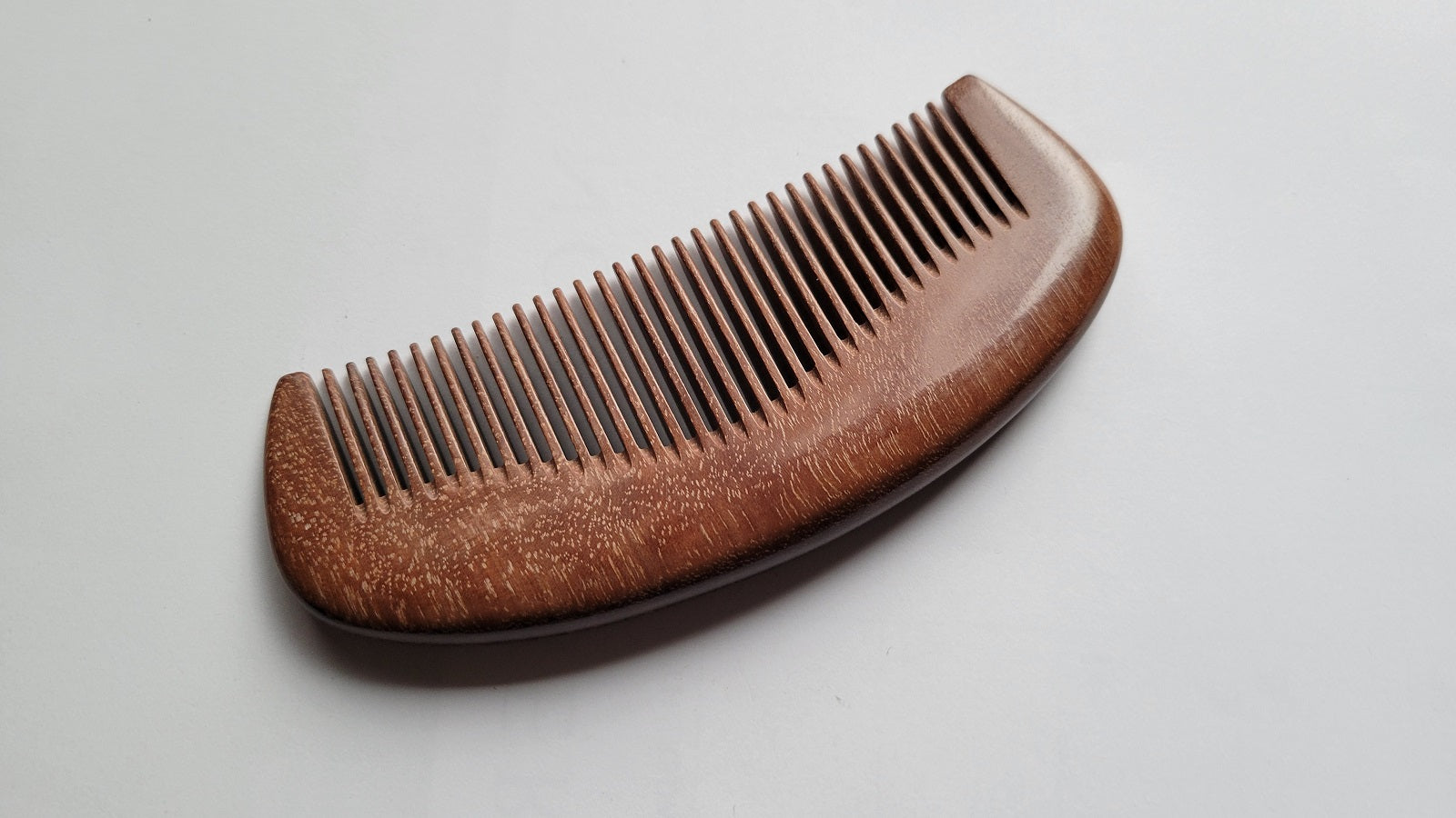 Pau Rosa wood pocket comb with drawstring gift bag — a refined everyday gift for him — Arakicrafts