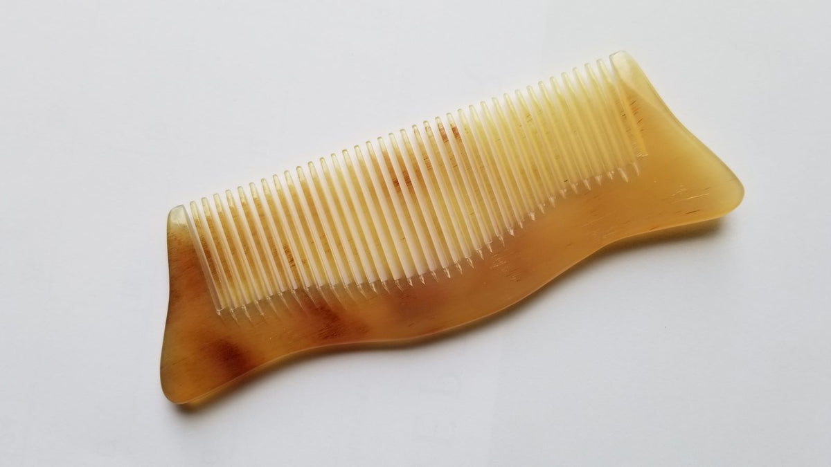A Vintage Style, Jade like Sheep Horn Comb diagonally placed