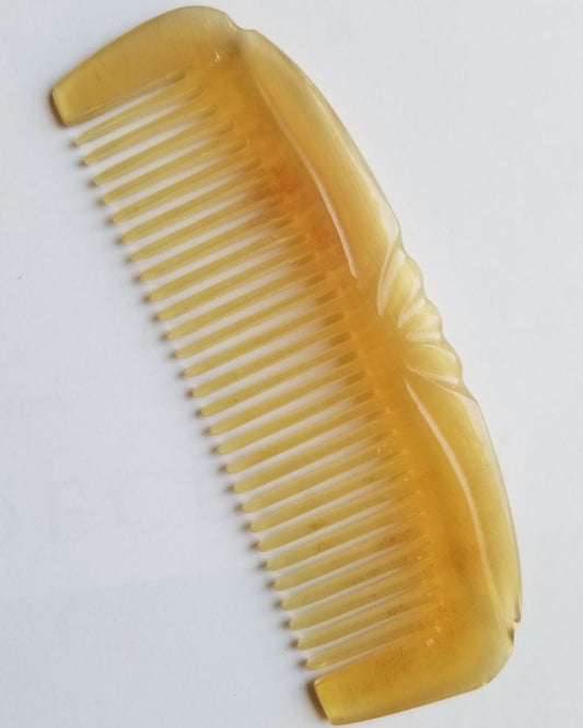 Translucent pale yellow to golden honey sheep horn comb, flat lay overhead showing natural tone variation — Arakicrafts