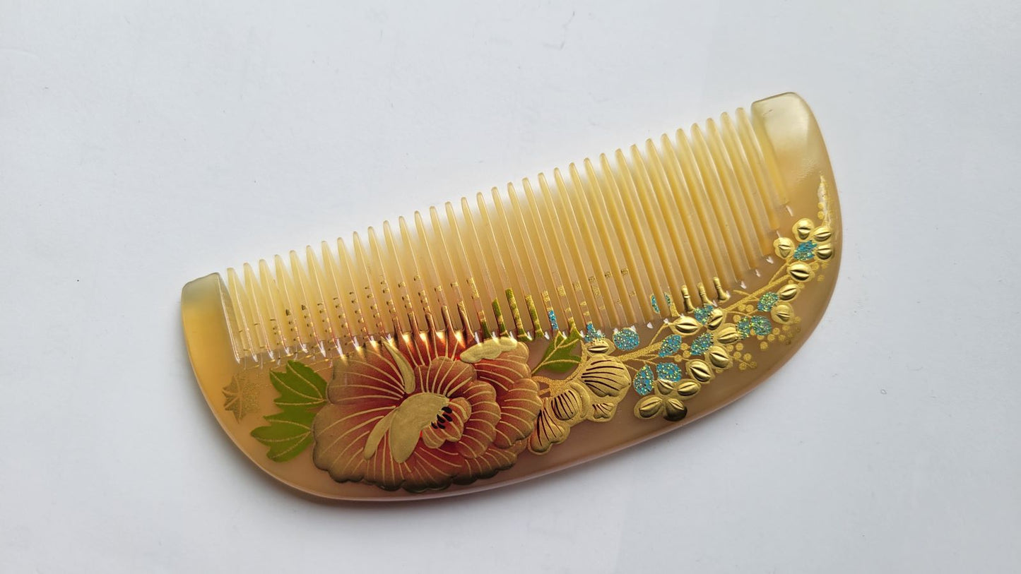 Chinese lacquer art sheep horn comb, hand-painted coral peony with gold floral sprigs and turquoise glitter accents, natural lacquer finish