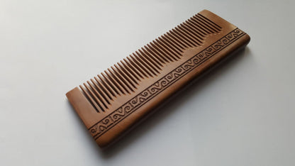 Peach wood fine tooth comb with comfortable grip, distributes natural hair oils, anti-static, all hair types