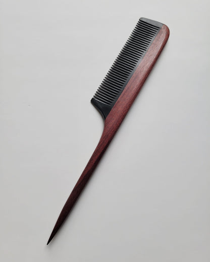 Purple heart wood rat tail comb back view, natural reddish-brown grain detail, hand-inlaid construction, single-piece artisan hair comb