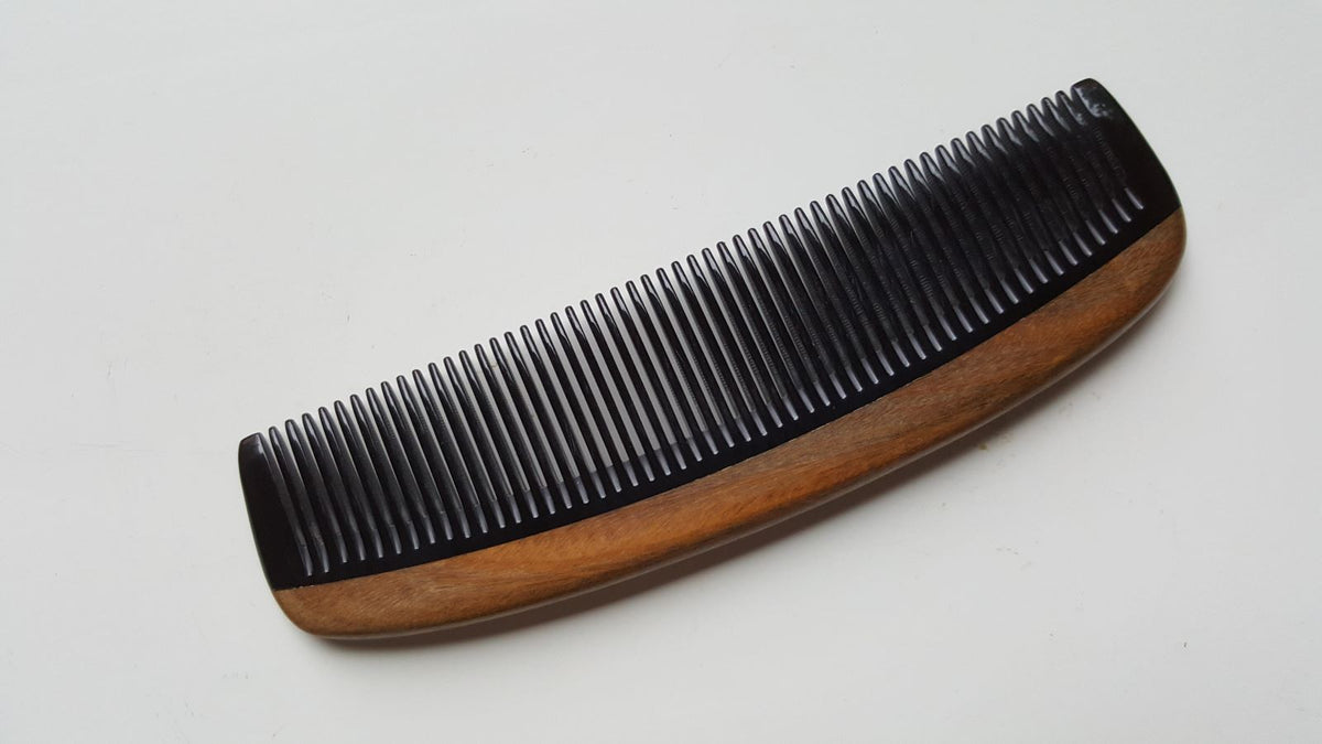 Slim fine tooth buffalo horn comb with Green Sandalwood handle, flat lay showing full silhouette — Arakicrafts