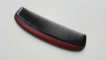 Hand inlaid beard comb in Purple Heart wood and buffalo horn, flat lay front view — Arakicrafts.  it is designed for hair and beard grooming. 