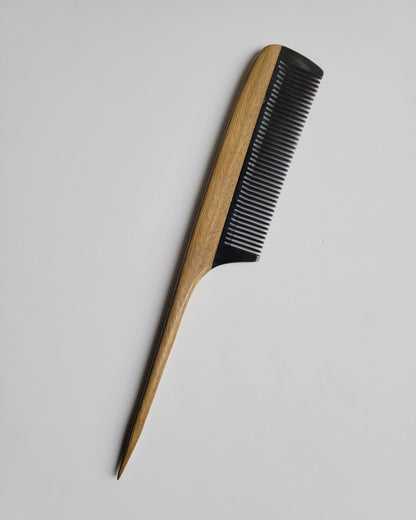 Hand-inlaid green sandalwood and buffalo horn rat tail comb, natural wood grain detail, artisan hair sectioning tool