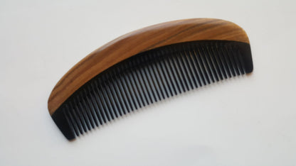 Classic Sandalwood Fine Teeth Horn Comb flat lay — three-quarter view showing no-handle design and fine tooth spacing