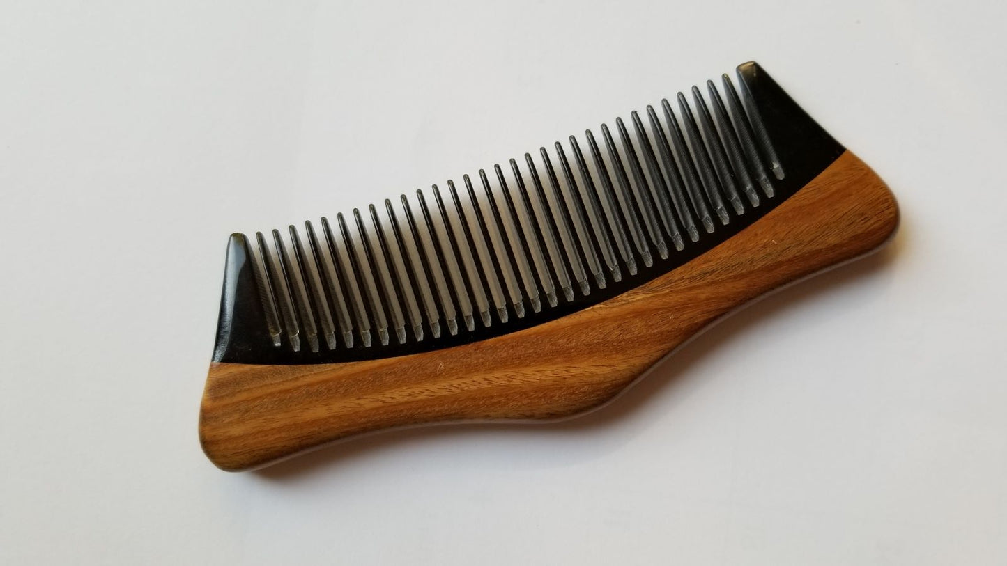 Handcrafted sandalwood horn comb flat lay, angled view of inlay construction — Arakicrafts