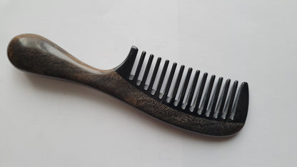 Handcrafted wood and horn comb with drawstring gift bag — flat lay showing comb and packaging together
