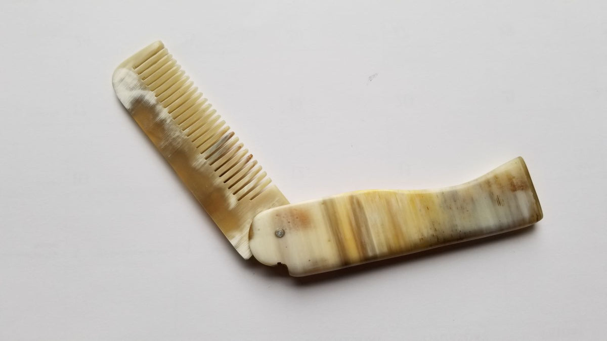Folding Yak Horn Comb — light brown white marbled horn pattern, unique natural grooming tool