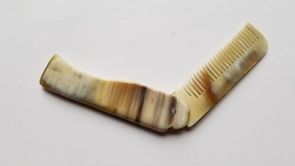 Folding Yak Horn Comb folded — pocket size, fine teeth protected, travel-ready grooming comb