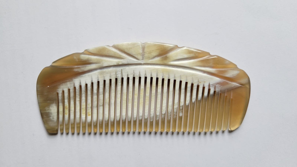 Yak horn comb with engraved fan starburst carving on spine, pale bone translucent horn, handcrafted fine tooth comb